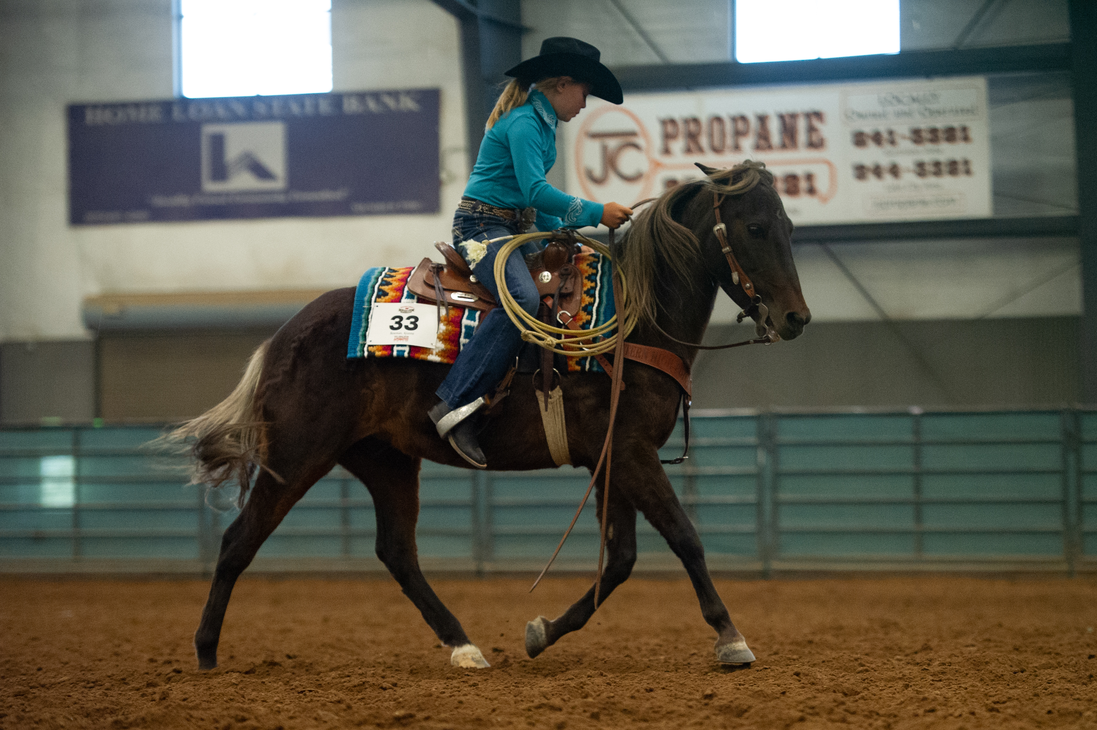 young lady riding horse at horse show at the fair & rodeo 2023